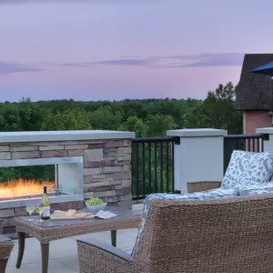 relaxing outdoor area with fireplace and sunset