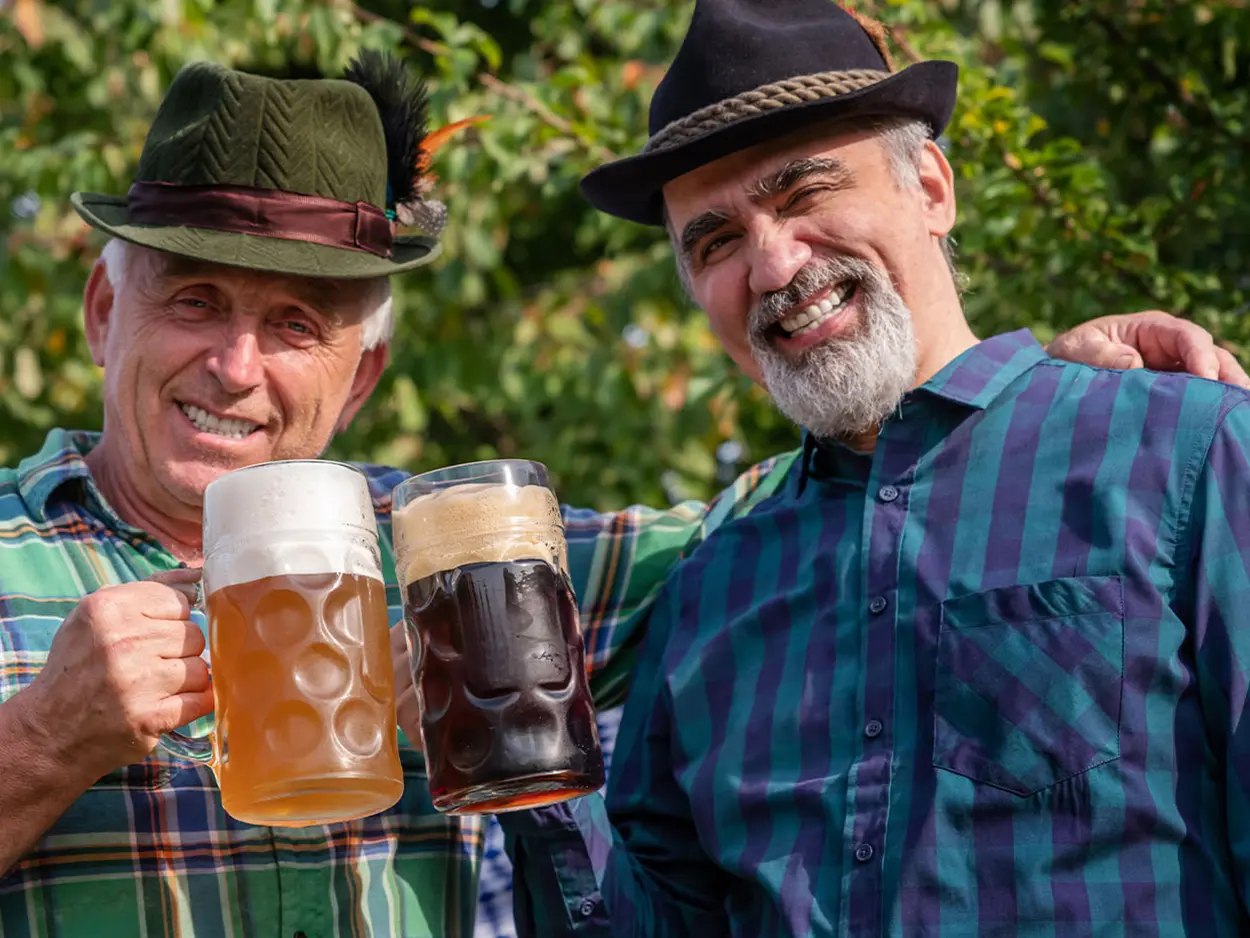 Two men enjoying drinks