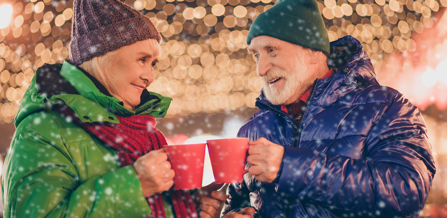 Man and woman with hot drinks